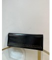 BOLSO NEGRO TACHAS